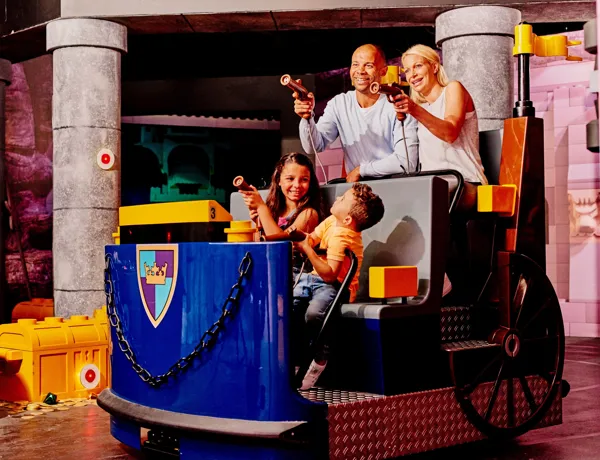 kids and parents on lego ride